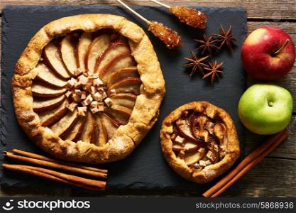 Apple galette over rustic background