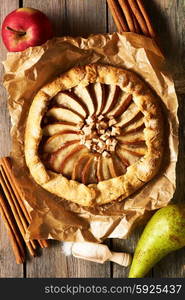 Apple galette over rustic background