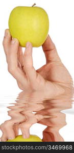 Apple in a hand low in calories a over white background