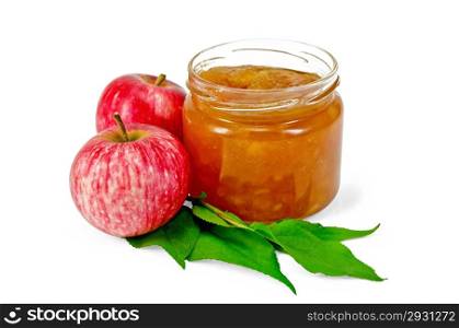 Apple jam in a glass jar, fresh red apples, twigs and leaves isolated on white background