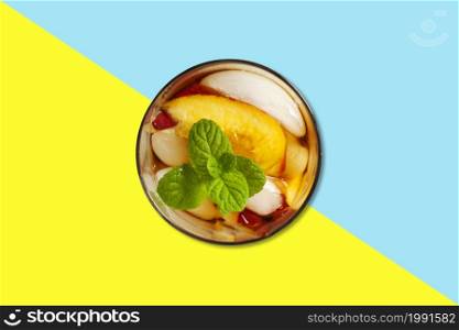 Apple juice on small cup with mint leaf flat lay concept isolated.