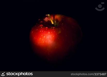 apple on a black background