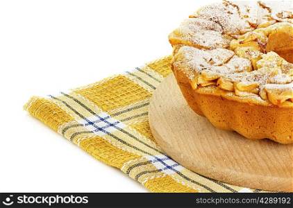 Apple pie, charlotte on a towel isolated on white background