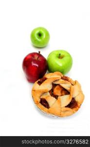 Apple pie for one on a white background with 2 green granny smith and one red apple. Apples And Apple Pie For One