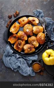 Apple quince baked with honey and cinnamon. Healthy vegetarian dessert
