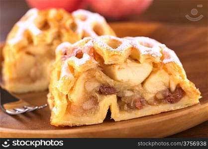 Apple strudel with raisins (Selective Focus, Focus on the left side of the apple-raisin stuffing)