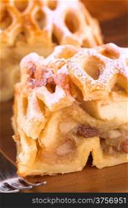 Apple strudel with raisins (Selective Focus, Focus on the upper part of the apple stuffing)