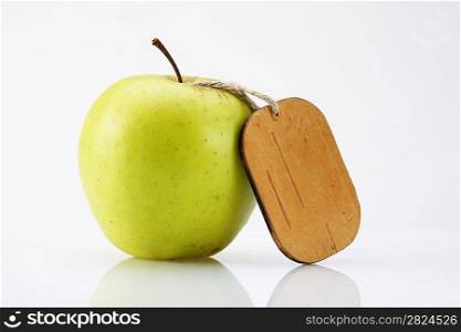 apple with tag on white background