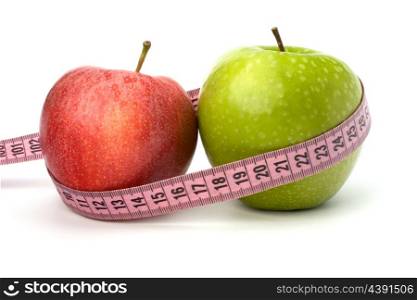Apple with tape measure isolated on white background. Healthy lifestyle concept.