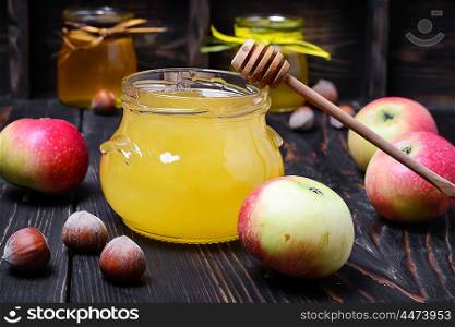 Apples and honey. Still life with apples and honey to the August holiday