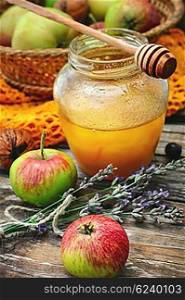 apples and jar of honey
