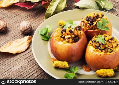 Apples baked with lentils, raisins and spices. Autumn dessert. Baked autumn apples