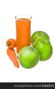 Apples, carrot and juice in glass
