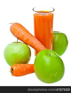 Apples, carrots and juice in a glass