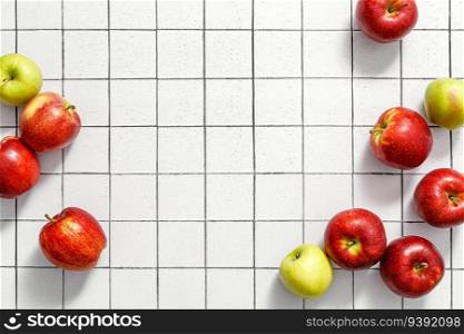Apples. Fresh juicy red and green apple fruits on kitchen table, copy space, top view