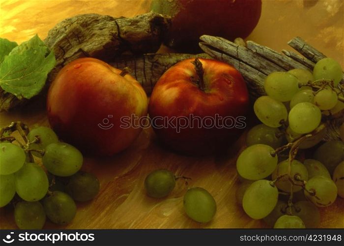 Apples,grapes etc multi fruits isolated on painted background