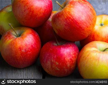 apples in a basket on a wooden table