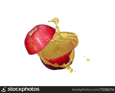 Apples is cut into two parts and the apple juice is splash on white