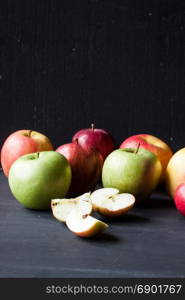 apples on a black background