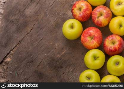 apples on a old wooden table, studio picture, with copy space. Free space for text