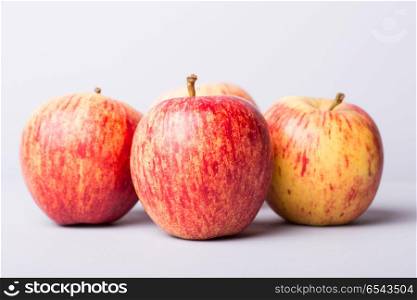 apples on a white wooden background, studio picture. apples