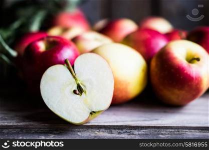 Apples on rustic wooden background
