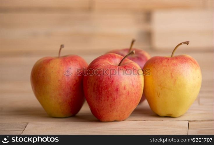 apples on wooden table, studio picture