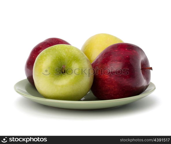 Apples pile on plate isolated on white background