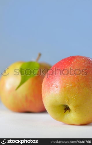 apples with dew drops on table