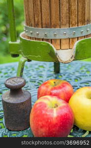 apples with old fruit press