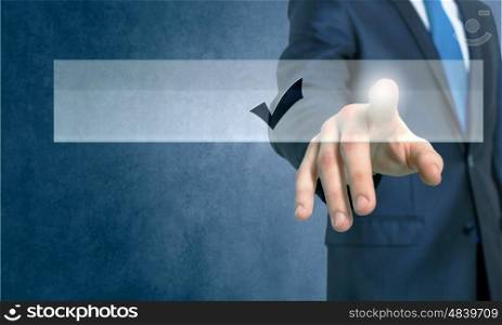 Application icon. Close up of businessman hand touching icon with finger