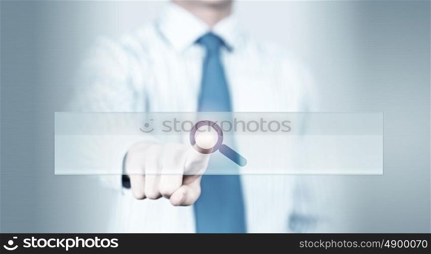 Application icon. Close up of hand touching icon with finger