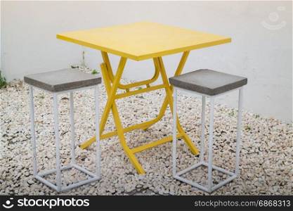 Applied chairs from metal and concrete, stock photo