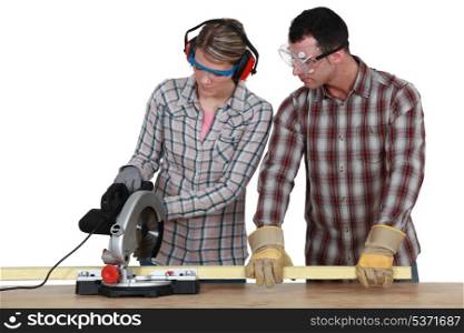 Apprentice with circular saw