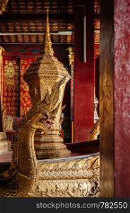 APR 5 Luang Prabang, Laos - Ancient Golden casket Royal Funeral Urn at Wat Xieng thong museum. Most Famous tourist attraction in World heritage zone
