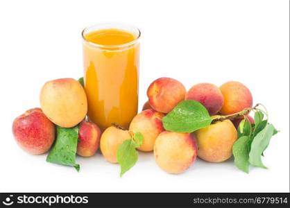 Apricots and glass juice. White isolated Studio shot