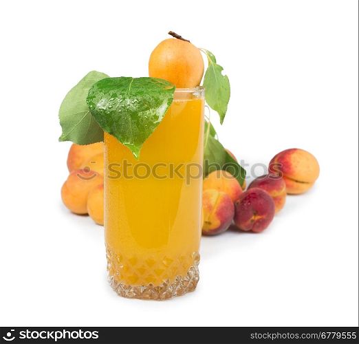Apricots and glass juice. White isolated Studio shot