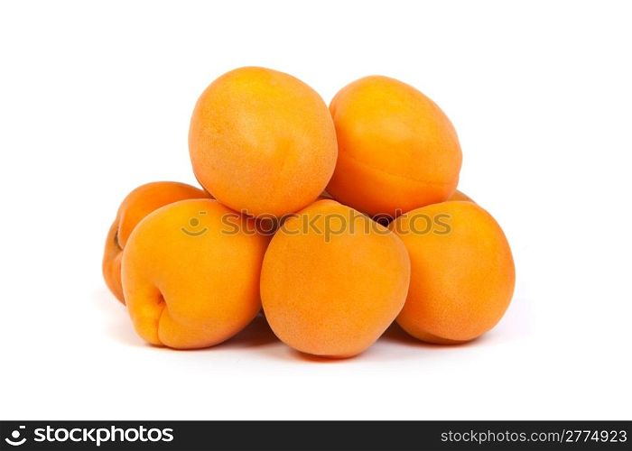 Apricots. Group of ripe apricots isolated on white background