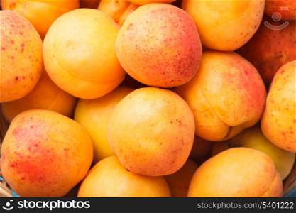Apricots in a basket on the table