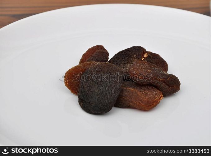 Apricots on plate