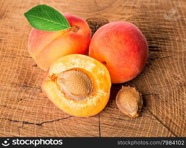 Apricots on the wooden background