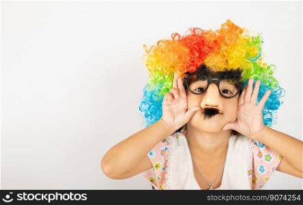April Fool’s Day. Two brothers funny kid little girl clown wears curly wig colorful big nos and glasses and mustache playing fool isolated on white background copy space, Happy child festive decor