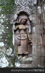 Apsara on the wall of Wat Phu temple in Champasak, Laos