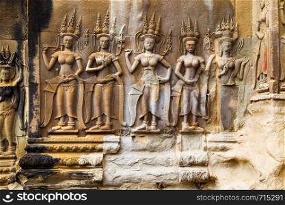 Apsaras - ancient bas relief in Angkor Wat Temple, Cambodia