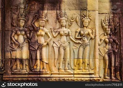 Apsaras - ancient bas relief in Angkor Wat Temple in Cambodia