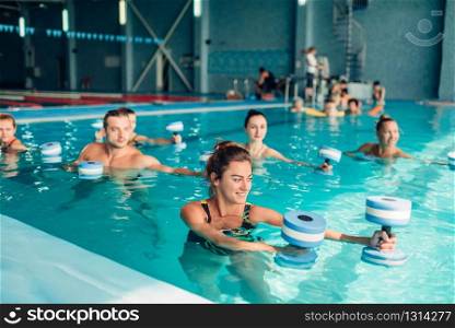 Aqua aerobics, healthy lifestyle, water sport, indoor swimming pool, recreational leisure. Aqua aerobics, healthy lifestyle, water sport
