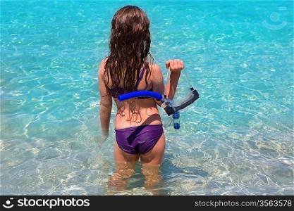 aqua beach in ibiza formentera rear kid girl view with snorkel