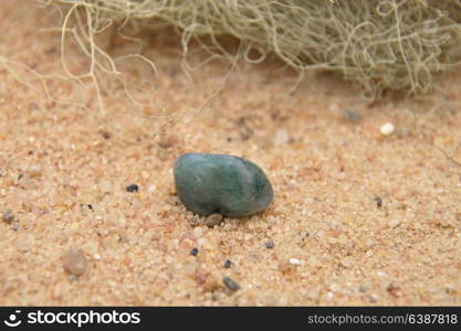 Aquamarine on beach