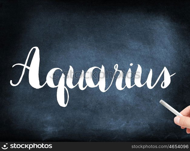 Aquarius written on a blackboard