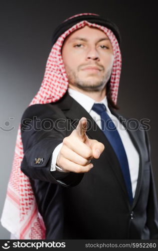 Arab businessman againt grey background